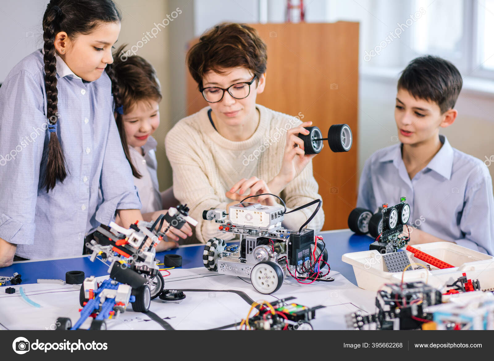 Happy children learn programming using laptops on extracurricular ...