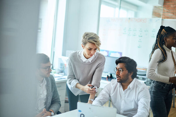 two clever men and awesome blond girl discussing the problems of the company