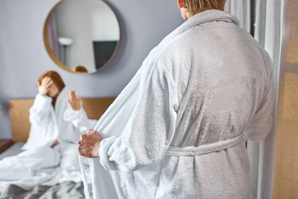 Frightened woman doesnt want to see shirtless guy — Stock Photo, Image