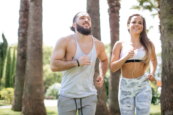 Young couple running