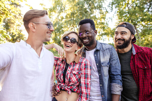 Group Of Friends Having Fun Together Outdoors