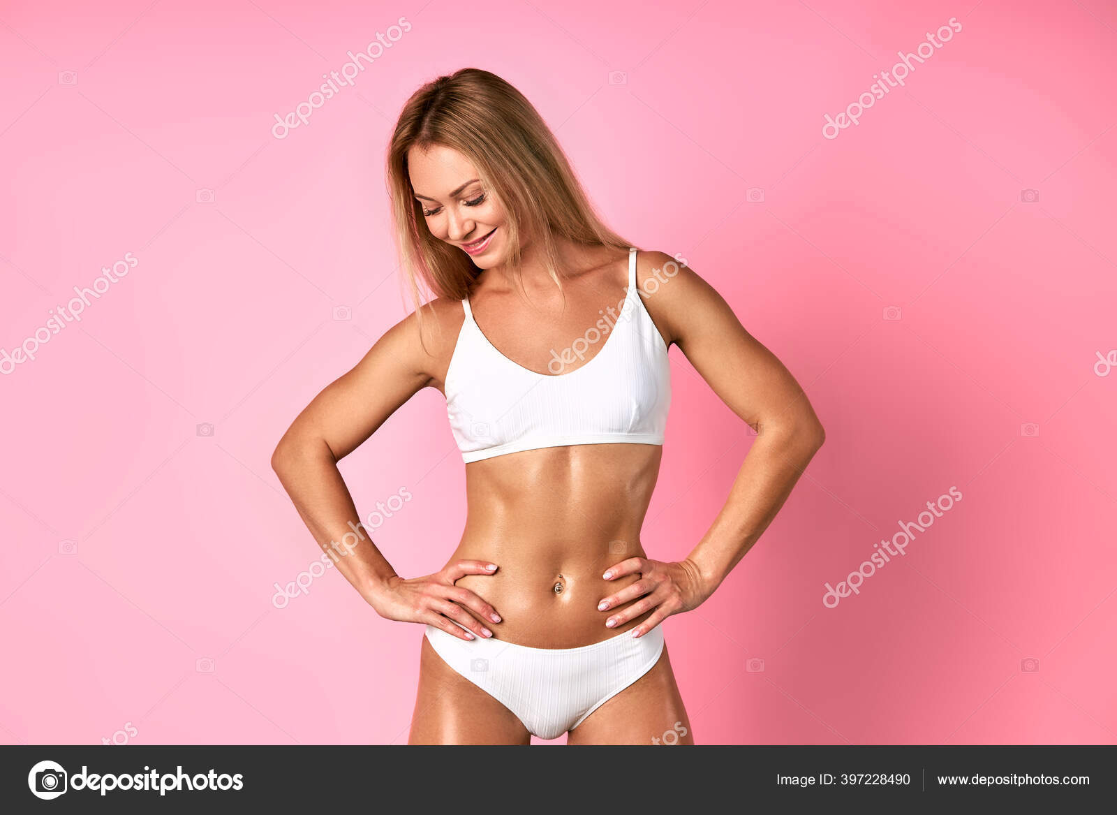 Cahrming model in white penties and