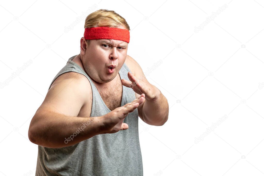 Fat man, feeling furious, in fight stance ready to hit, white isolated studio
