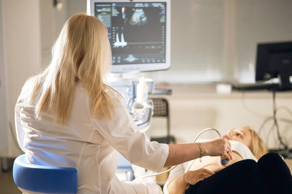 second screening . woman is viting a gynecologist