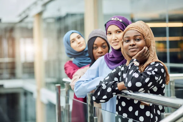 Multiracial group of muslim women dressed in national clothes posing in group — Stock Photo, Image