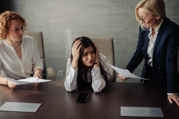 Desperate female office manager unable to cope with too many tasks from boss. — Stock Photo, Image