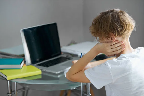 Portrait of young caucasian teen boy studying at home — Stock Photo, Image