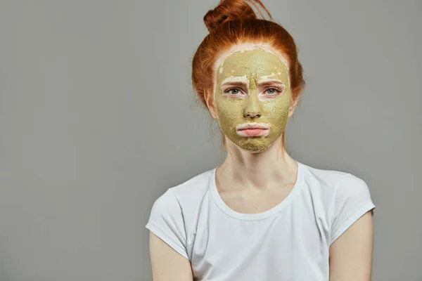 unhappy housewife with green face