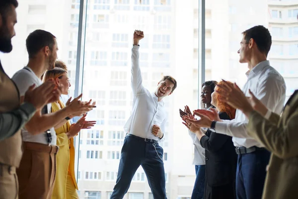 Great job Successful young business team is clapping their hands to business man for great job — Stock Photo, Image