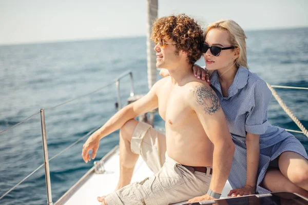 Tender and attractive adult female, spending time on boat with her lover. — Stock Photo, Image