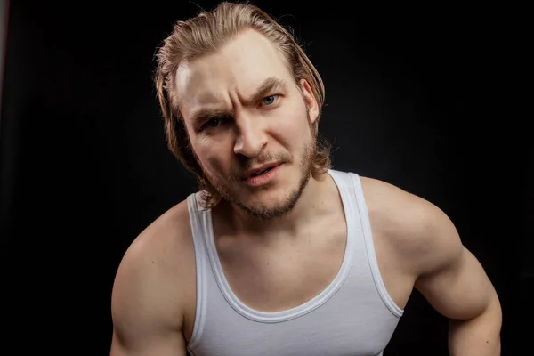 Big and strong muscular man laying. Angry fighter having a dust-up. — Stock Photo, Image