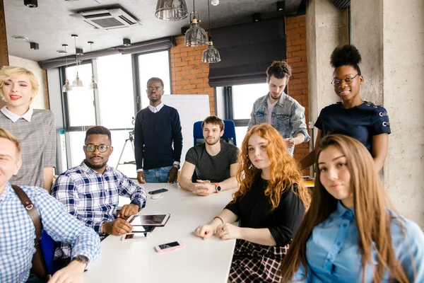 workers with different nationalities. human rights. self-appointed group.