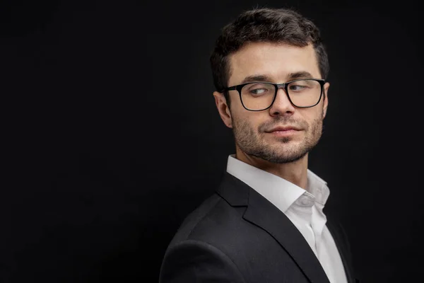 Close up side view portrait of young attractive businessman looking back — Stock Photo, Image