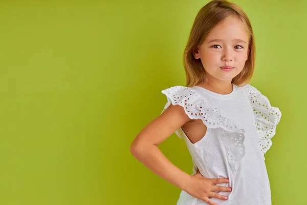 Adorable little model girl posing at camera — Stock Photo, Image