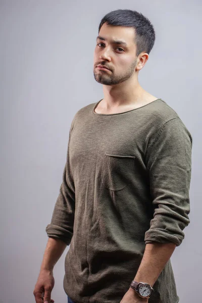 Close up side view portrait of handsome boy in grey sweatshirt. — Stock Photo, Image