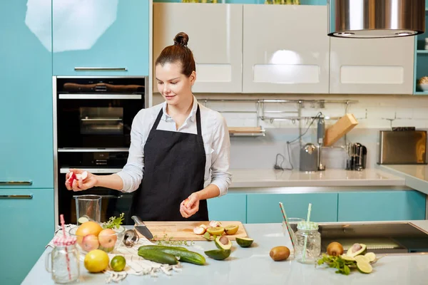 Young awesome female making up a meal — Stock Photo, Image