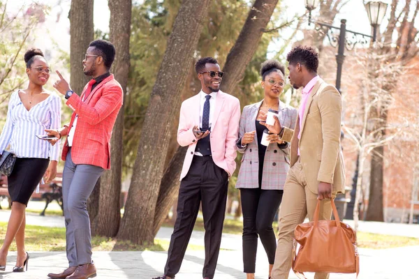 Friendly colleagues are going to work — Stock Photo, Image