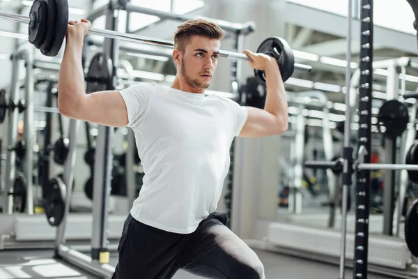 Training with barbell — Stock Photo, Image