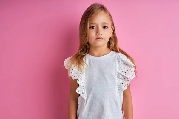 Calm serious little girl look at camera, posing — Stock Photo, Image
