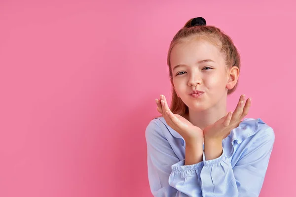 Adorable little girl sent kisses at camera — Stock Photo, Image