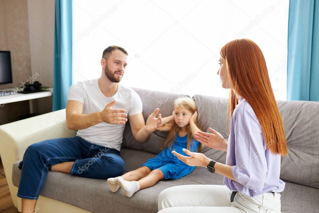 young caucasian parents argue at home