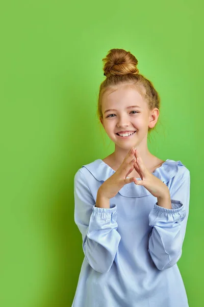 Intelligent caucasian kid girl is thinking about something — Stock Photo, Image