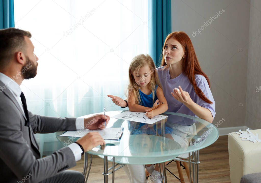 depressed caucasian woman with child girl get support by psychologist