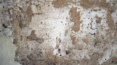 Eski duvar dokusu. Eski çimento duvarlar ay yüzeyine benziyor. Çimento duvar arka planı.