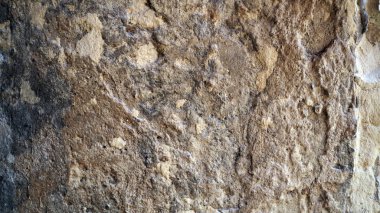 Eski duvar dokusu. Eski çimento duvarlar ay yüzeyine benziyor. Çimento duvar arka planı.