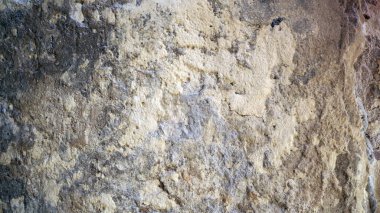 Eski duvar dokusu. Eski çimento duvarlar ay yüzeyine benziyor. Çimento duvar arka planı.