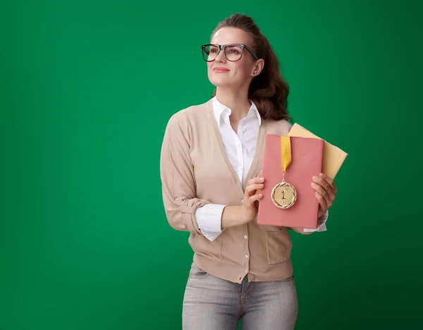 Proud Modern Student Woman Books Medal Looking Green Background — Stock Photo, Image