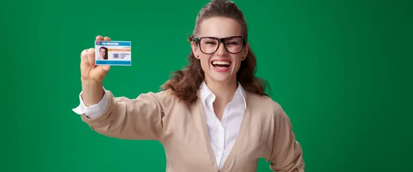 Attractive Student Woman Laughing Showing Student Card Green Background — Stock Photo, Image