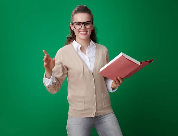 Smiling Modern Student Woman Book Explaining Green Background — Stock Photo, Image