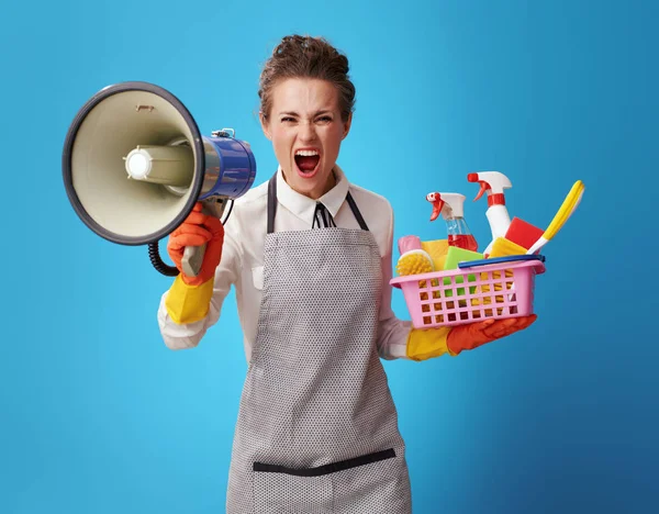 Angry Young Cleaning Lady Apron Basket Cleansers Brushes Shouting Megaphone — Stock Photo, Image