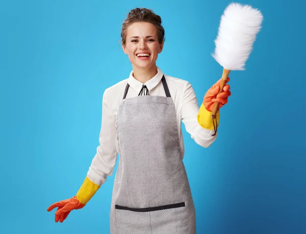 Happy Young Housemaid Apron Using Dust Cleaning Brush Blue Background — Stock Photo, Image