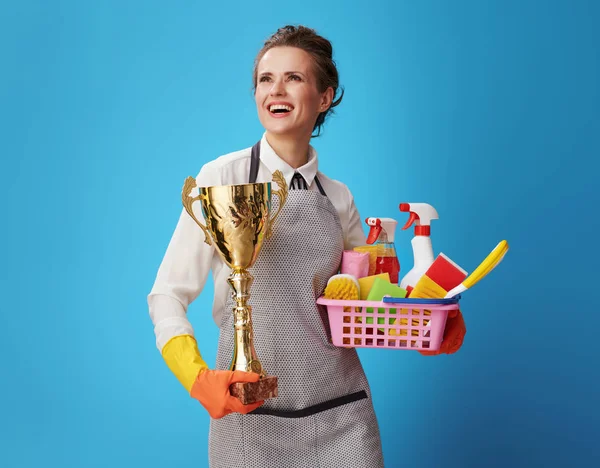 Proud Young Scrubwoman Apron Protective Orange Gloves Basket Cleansers Brushes — Stock Photo, Image