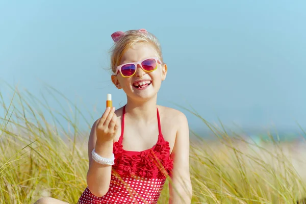Portrait Modern Girl Red Swimwear Holding Lipstick Spf Beach Sunny — Stock Photo, Image