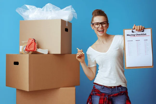 Happy Modern Woman White Shirt Cardboard Box Showing Moving Checklist — Stock Photo, Image