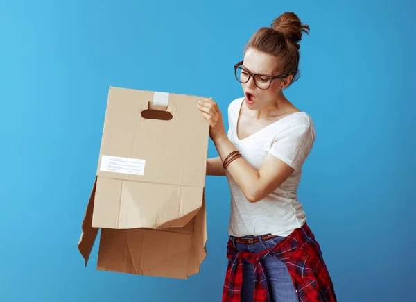 Stressed Young Woman White Shirt Shakes Out Something Old Cardboard — Stock Photo, Image