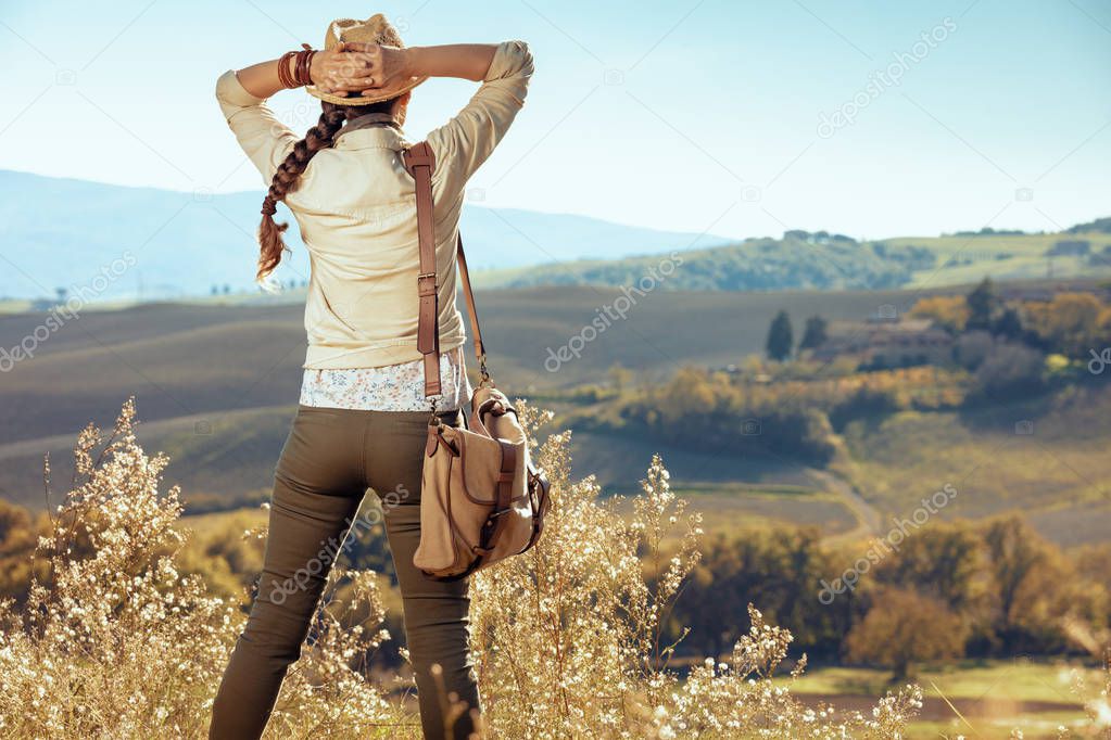 active tourist woman looking into distance