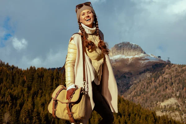 traveller woman against mountain landscape