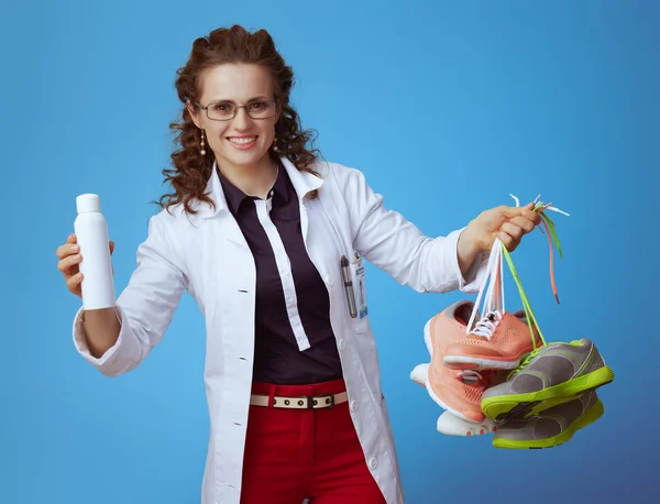 Happy Modern Medical Practitioner Woman Bue Shirt Red Pants White — Stock Photo, Image