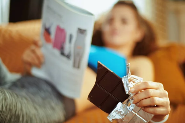 Closeup Chocolate Bar Hands Fit Woman Laying Divan Journal Modern — Stock Photo, Image