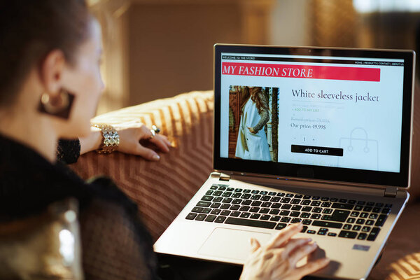 trendy housewife ordering clothes while shop online