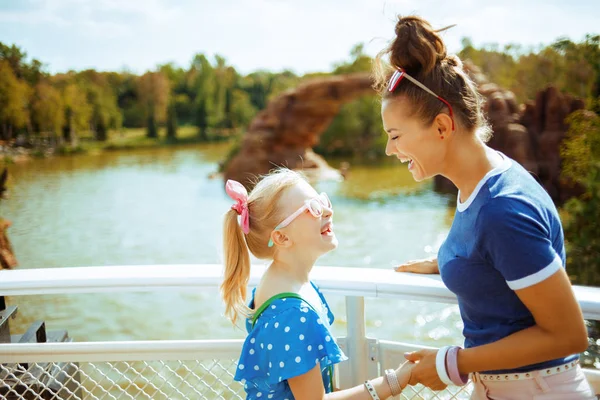 Mother and daughter travellers having fun time while river cruis — Stock Photo, Image