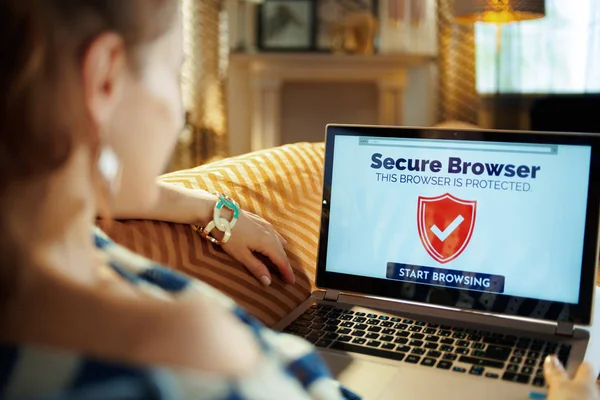 modern woman using secure browser on laptop