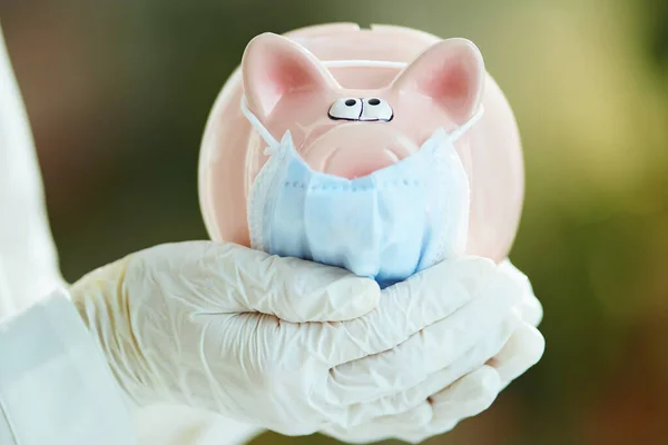 Life Covid Pandemic Closeup Woman Gloves Showing Piggy Bank Wearing — Stock Photo, Image
