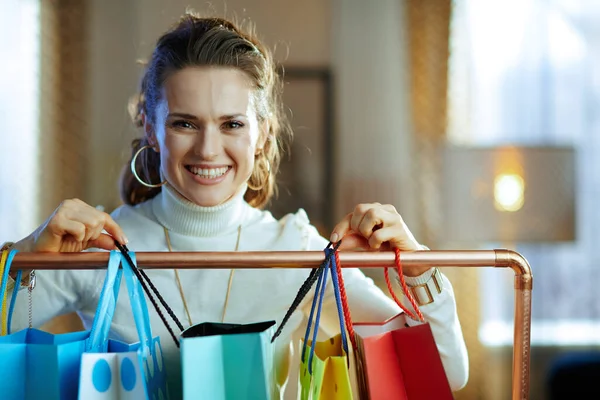 Smiling Young Woman White Sweater Skirt Colorful Shopping Bags Hanging — Stock Photo, Image