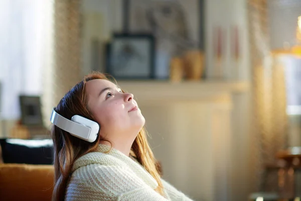 Modern Young Woman Red Hair White Sweater Listening Music Headphones — Stock Photo, Image