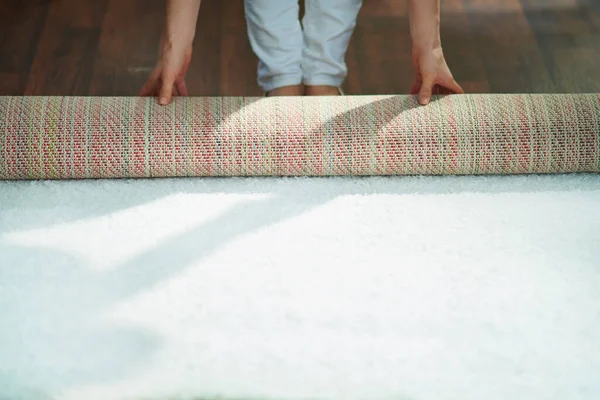 Closeup Woman Living Room Sunny Day Folding Carpet Roll — Stock Photo, Image